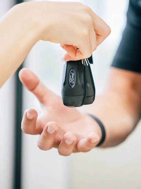 handing a set of keys over