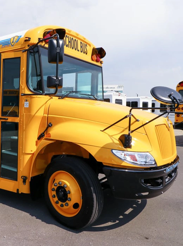front of a yellow school bus